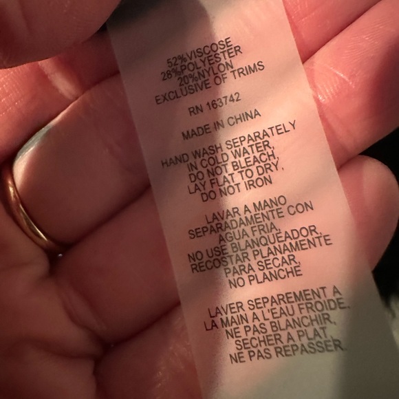 Sioni Black Crew Neck Sweater with Scoop Neckline and Feather Trim Cuffs - Picture 4 of 5